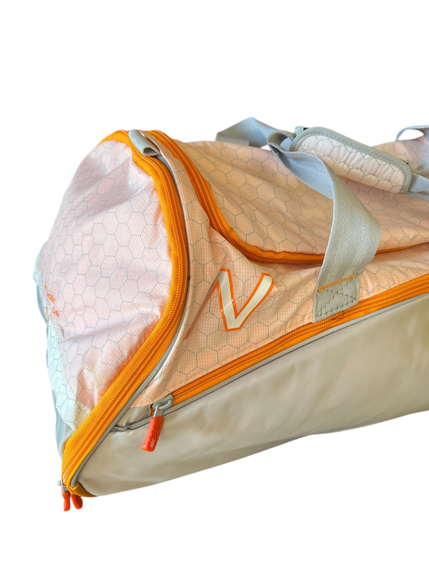 orange and gray New Balance Duffle bag